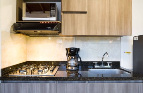 Astorga Apartment | King Bed studio AC, Hot tub By Exito Two TV's