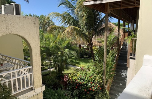 Negril Villa | King Suite at Oceanview Resort in Jamaica - Enjoy 7 miles of White Sand Beach! by RedAwning