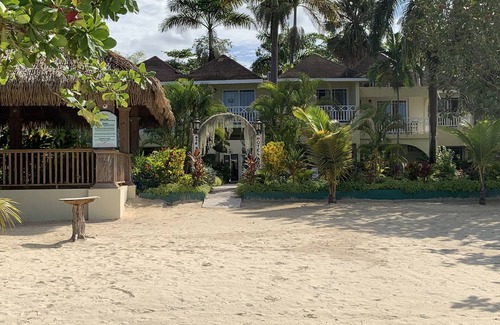 Negril Villa | King Suite at Oceanview Resort in Jamaica - Enjoy 7 miles of White Sand Beach! by RedAwning