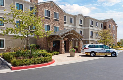 Lake Forest Condo | King Suite. Free Breakfast. Outdoor Pool & Hot Tub.