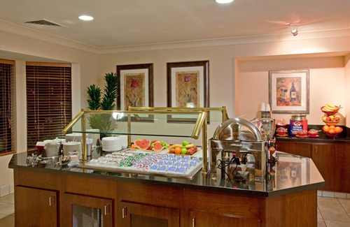 Palmdale Apartment | King Suite. Free Breakfast. Outdoor Pool & Hot Tub. Near Edwards Air Force Base!