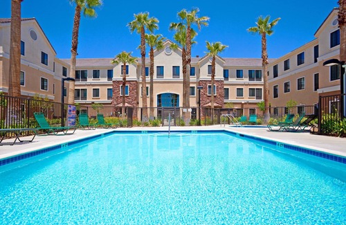 Palmdale Apartment | King Suite. Free Breakfast. Outdoor Pool & Hot Tub. Near Edwards Air Force Base!