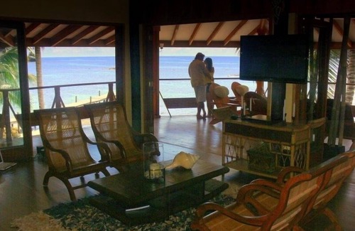 Carenero Island Bed & Breakfast | King Suite Ocean and Jungle View wrap around private balcony