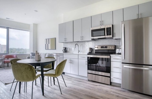 Alexandria West Apartment | King Suite with coffee bar that provides a wonderful living experience!