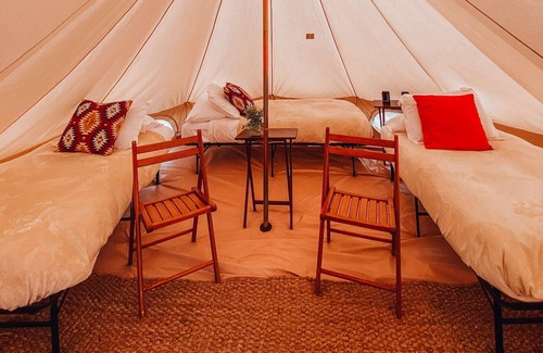 Tropic House | King Tent w/Shared Bathroom - Beauty awaits you just past the red cliffs.