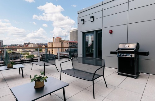 Central Business District Apartment | Kislak 507 Stunning 2BR with Den Corner Apt Retreat Above the City