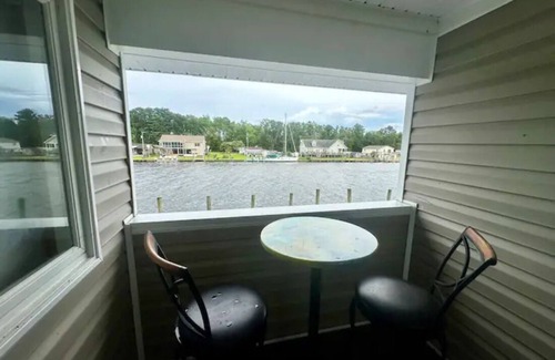 Coinjock Apartment | Knot Two- Balcony View of ICW- Dog Friendly