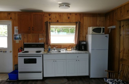 Ingonish Beach Hotel | Knotty Pine Cottages