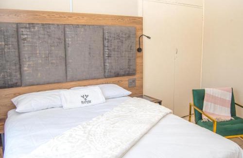 Welkom House | Kololo at 399 Guesthouse & Conference