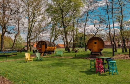 Lastrup House | Kuhle Auszeit - Fass Sonnenblume