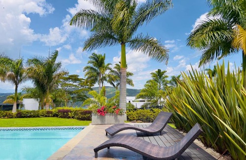 Calima Villa | Lago Calima Bliss: Secret Garden Paradise in Darien