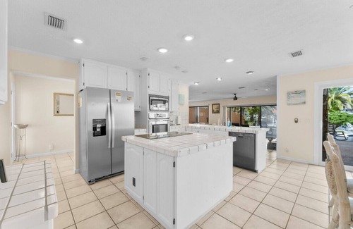 Silver Sands House | Lagoon Beach House: Dock, Pool, & Beach Nearby! Sleeps 11!