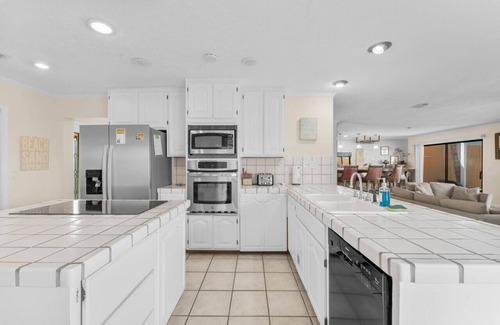 Silver Sands House | Lagoon Beach House: Dock, Pool, & Beach Nearby! Sleeps 11!