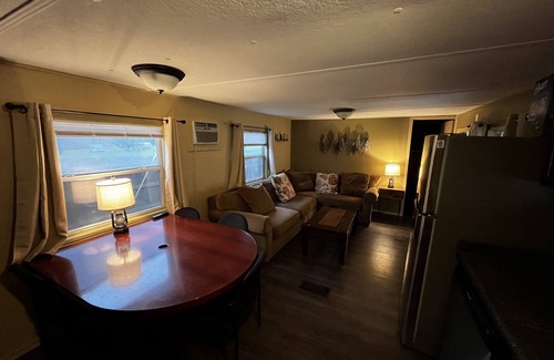 Buchanan Dam Cottage | Lake Buchanan Water Front Cabin ~ Hot Tub, Fire Pit lounge, Grill, Kayaks.