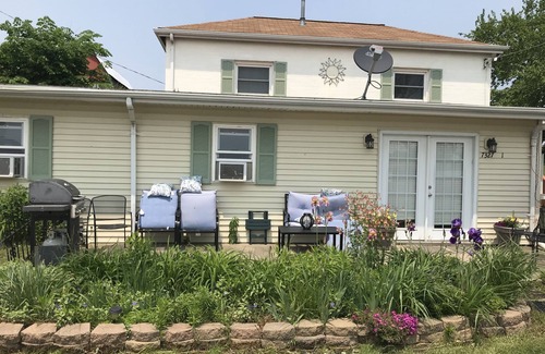Delton Apartment | Lake Front 1 bedroom upstairs apartment above 2 bedroom cottage.