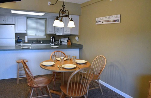 White Mills Condo | Lake Front One Bedroom Condo Boat Slip Included