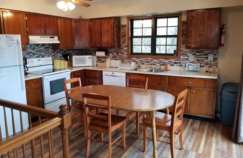 Big Creek Cottage | Lake Front Prop, includes two kayaks, canoe, covered dock with jet ski dock