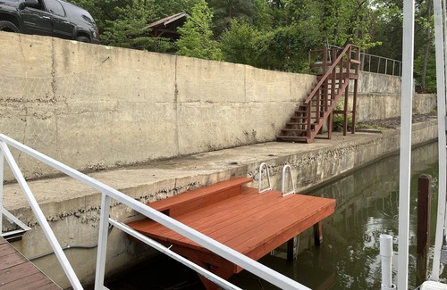 Piney House | Lake home, includes boat and outdoor bar facing lake.Pool coming soon!