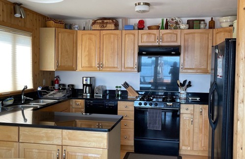 Lake Nebagamon House | Lake Nebagamon lake front home with private dock, short walk from Dairy Queen.