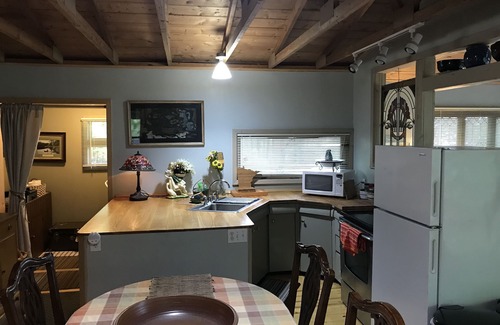Grand Rapids Cabin | Lake Pokegama recreational cabin with private sandy beach and diving platform.