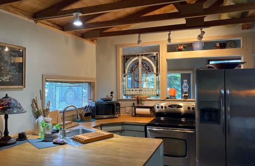 Grand Rapids Cabin | Lake Pokegama recreational cabin with private sandy beach and diving platform.