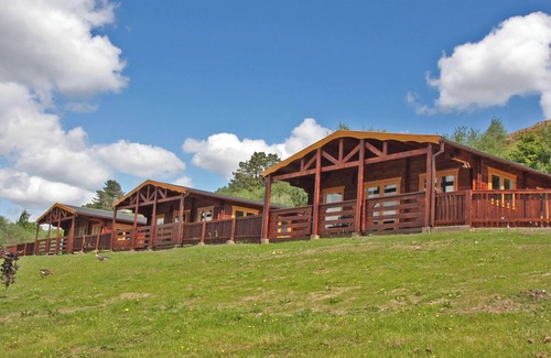 Pontardulais Cottage | Lake side log cabin peacefully situated and each enjoying fabulous lake views.