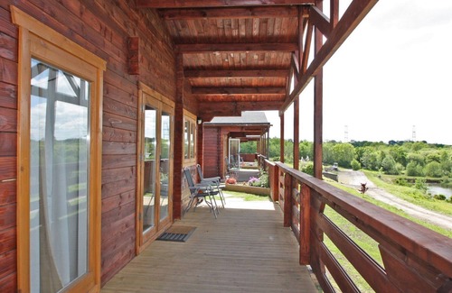 Pontardulais Cottage | Lake side log cabin peacefully situated and each enjoying fabulous lake views.