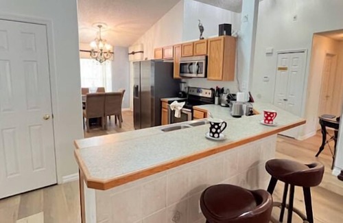 Crescent Lakes House | Lake View - South Facing Pool & Spa - Game Room - Nr Disney - Quiet Community