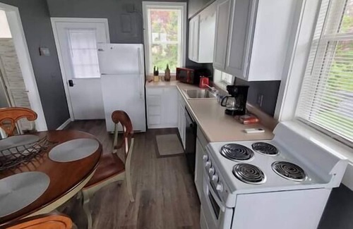 Huron House | Lakefront 1 bedroom loft historic train depot!