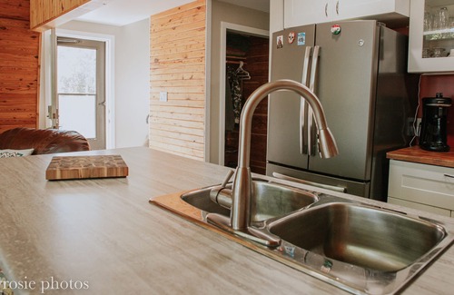 Winnipeg Beach Cabin | Lakefront cottage with 2 decks, firepit capturing amazing sunrises.