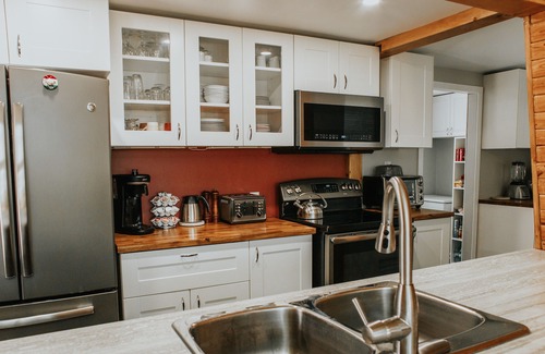 Winnipeg Beach Cabin | Lakefront cottage with 2 decks, firepit capturing amazing sunrises.