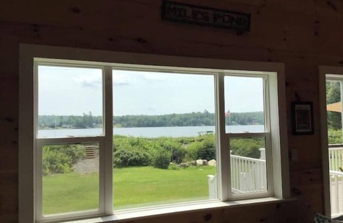 Concord Cottage | Lakefront Cottage on beautiful Miles Pond w/dock.