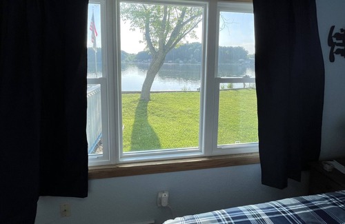 Battle Creek House | Lakefront Cottage w/ boat launch on peaceful lake!