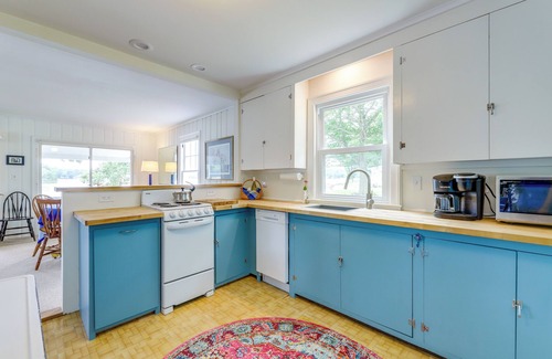 Coventry Lake Cottage | Lakefront Cottage w/Covered Porch & Dock!