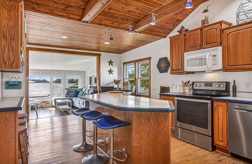 Hingham House | Lakefront Cottage with kayaks, paddleboat, aqua mat, & BIG deck close to Elkhart
