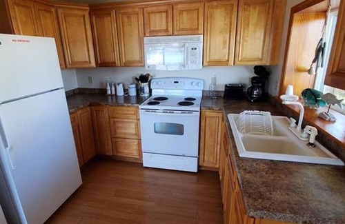 Castile House | Lakefront Cottage with Stunning Views. Boat available to rent with cottage!