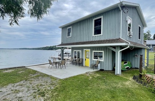 Castile House | Lakefront Cottage with Stunning Views. Boat available to rent with cottage!