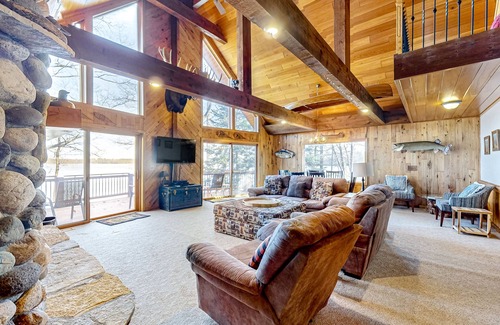 Conover House | Lakefront getaway with private hot tub, dock, fireplace, washer/dryer, & AC