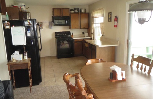 Grand Isle House | Lakefront Home, 60 Ft. Dock, Great Sunsets, Internet, Walk to Ladds Marina
