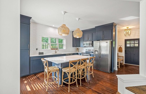 Arley House | Lakefront home with private dock, kayaks/SUP, firepit, decks, & Ping-Pong