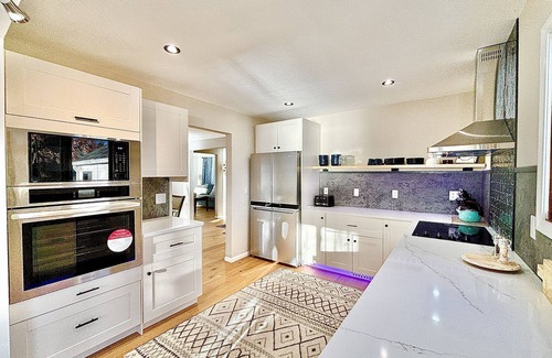Brooklyn Center Cottage | Lakefront House w/King Bed, Sauna, walk-in shower and lake access