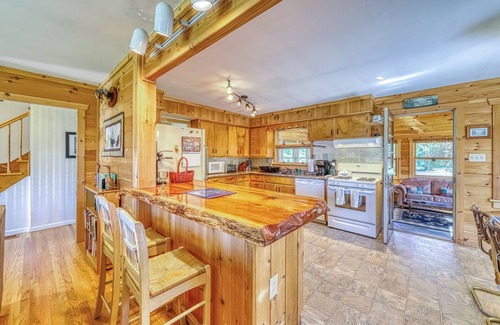 Brant Lake House | Lakefront house with 275' of waterfront, enclosed porch, & firepit