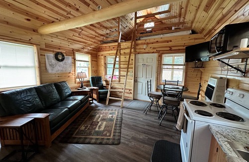 Tomahawk Cabin | Lakefront Lodging, Beach, Fire Pit, Bar & Grill, Rentals, Live Music, Trails