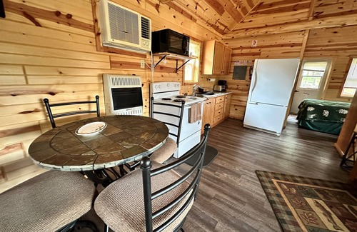 Tomahawk Cabin | Lakefront Lodging, Beach, Fire Pit, Bar & Grill, Rentals, Live Music, Trails