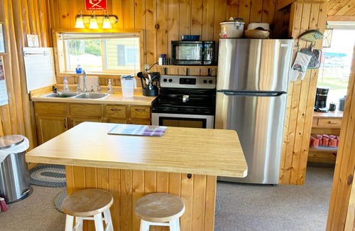 Crivitz Cabin | Lakeside Cabin on Lake Noquebay - Including Your Own Pier, Kayak/Canoes, & More!