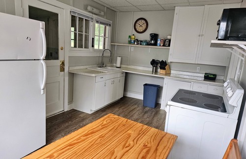 Shawano Cottage | Lakeview Bliss: Shawano Getaway - Short walk to public beach and park