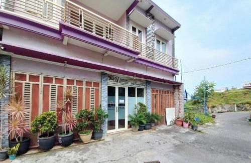 Oro Oro Ombo Hotel | Lancar Homestay Syariah near BNS Mitra RedDoorz