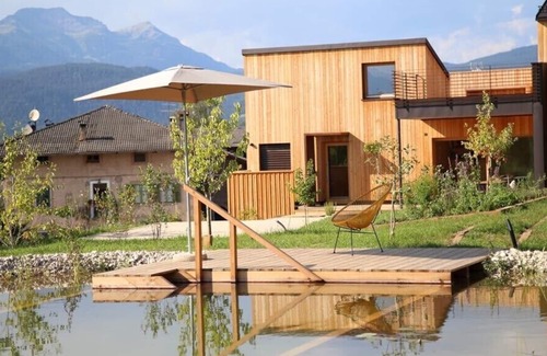 Sarnonico House | Landhaus Silene: new + modern wooden house with large natural garden and swimming pond