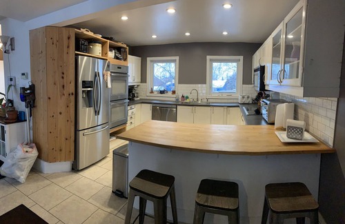 Yellowknife House | Large home with extras. Large yard, fire pit, Deck, BBQ, sunroom, hot tub, pool