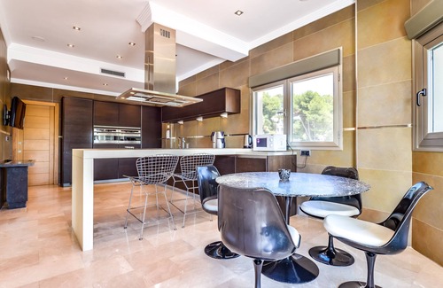 Urbanitzacio la Fustera Villa | Large modern villa with indoor and outdoor pool sauna and bar.
